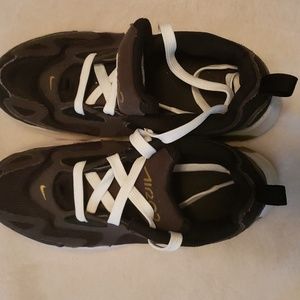 Black and gold Nike Air